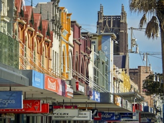 a row of buildings on a city street