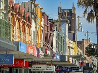 a row of buildings on a city street