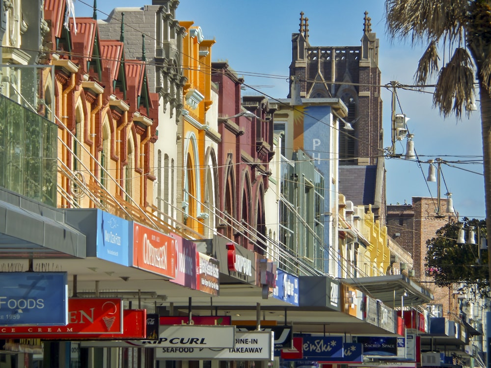 a row of buildings on a city street