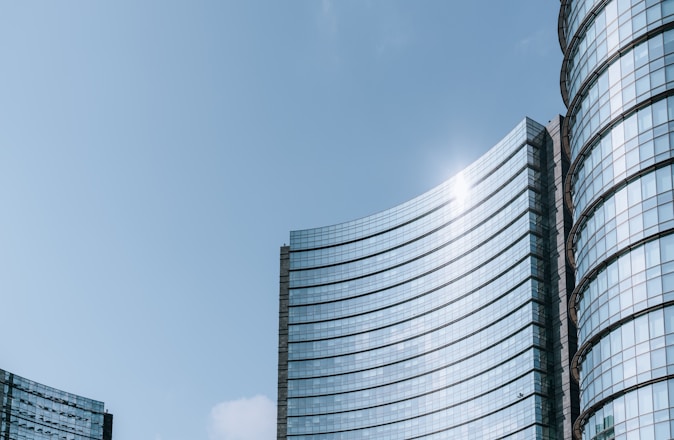 a very tall building next to a very tall building