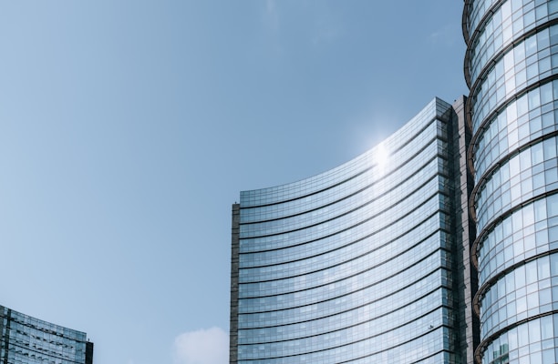 a very tall building next to a very tall building