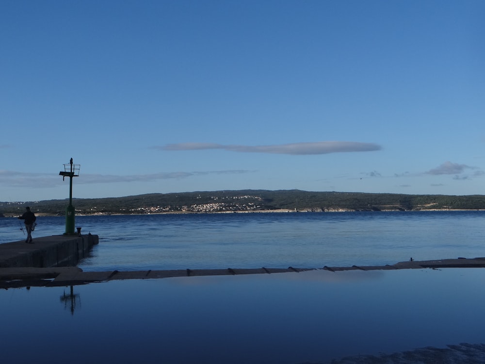 a body of water with a sky background