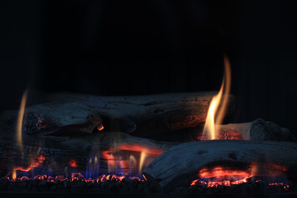 a close up of a fire burning in a fireplace