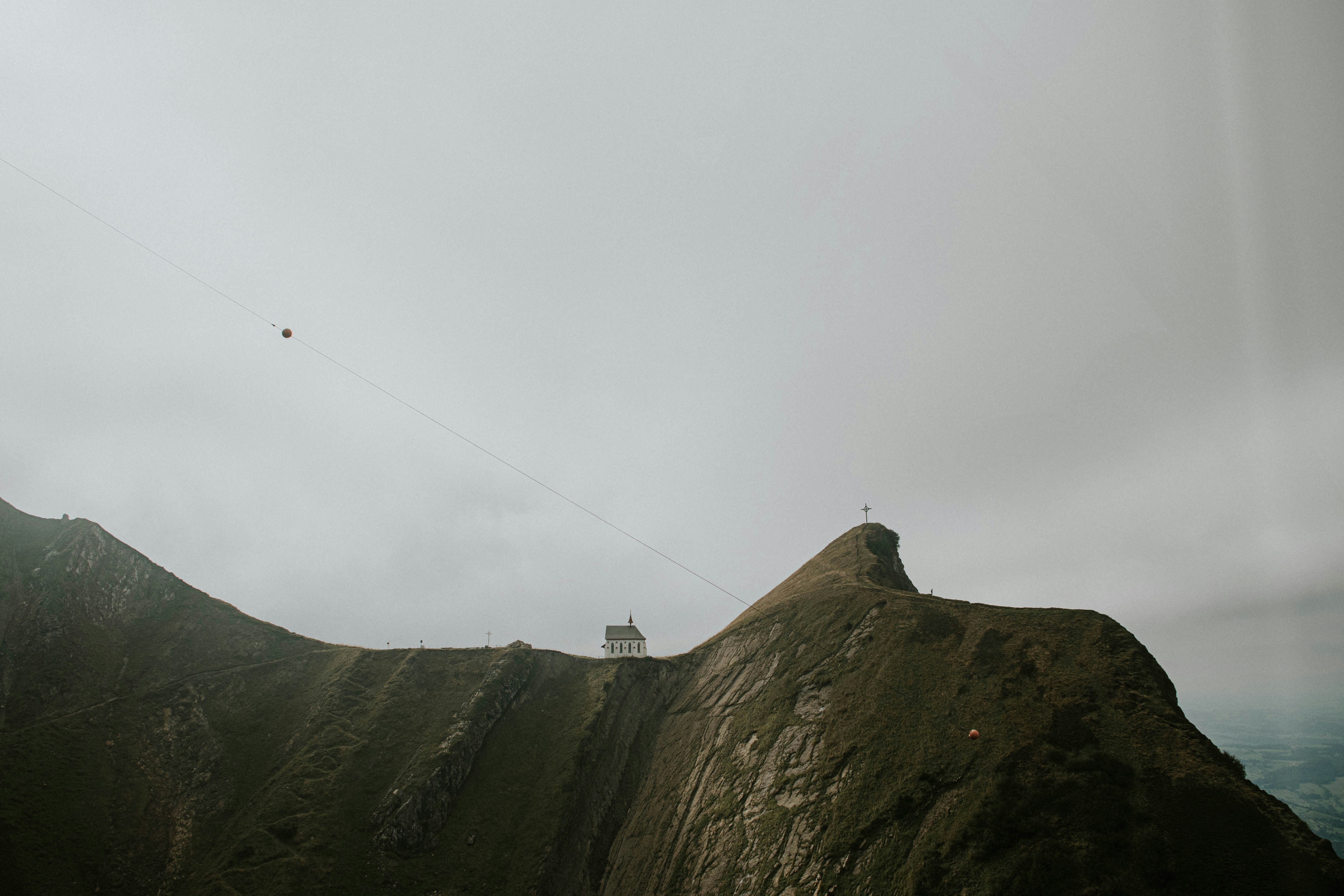 a view of a mountain with a sky background