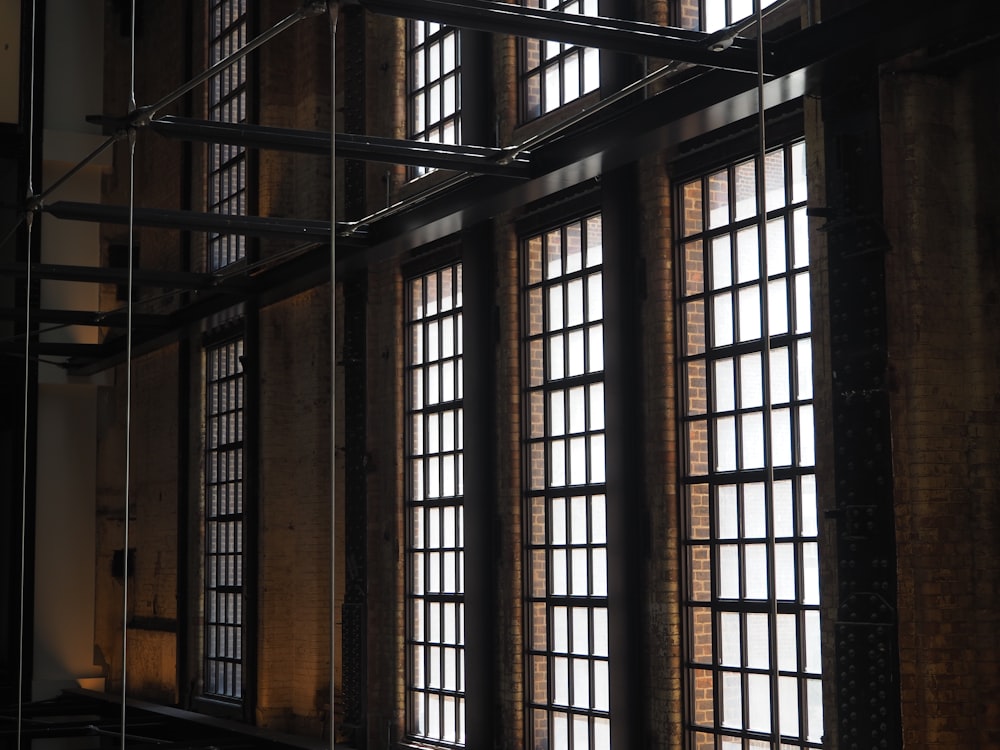a large room with lots of windows and bars