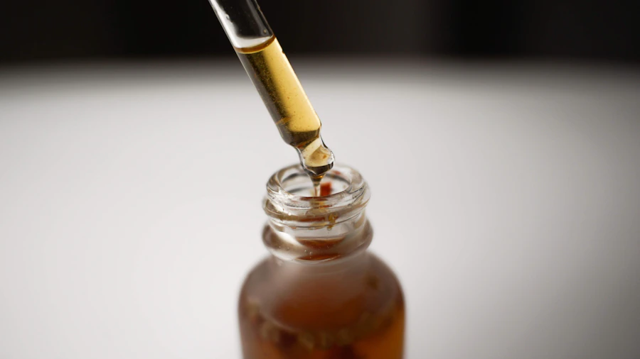 Serum dropper above a glass bottle, a decorative skincare photograph