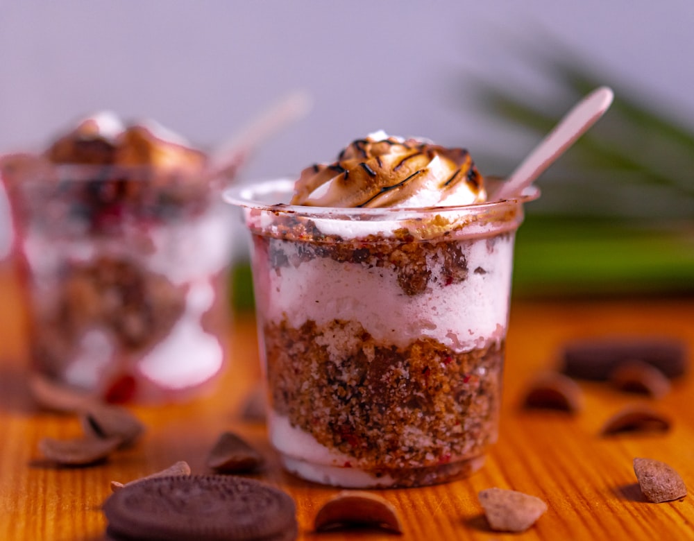 a dessert in a glass with a spoon in it