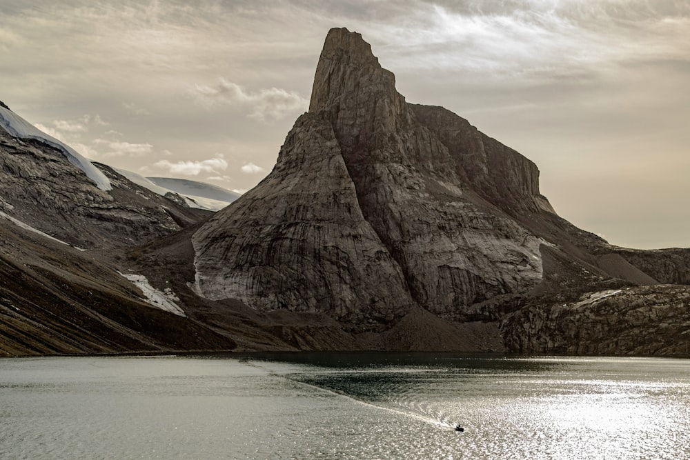 a mountain with a lake in front of it