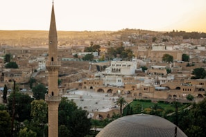A scenic view of traditional Tunisian architecture at sunset.