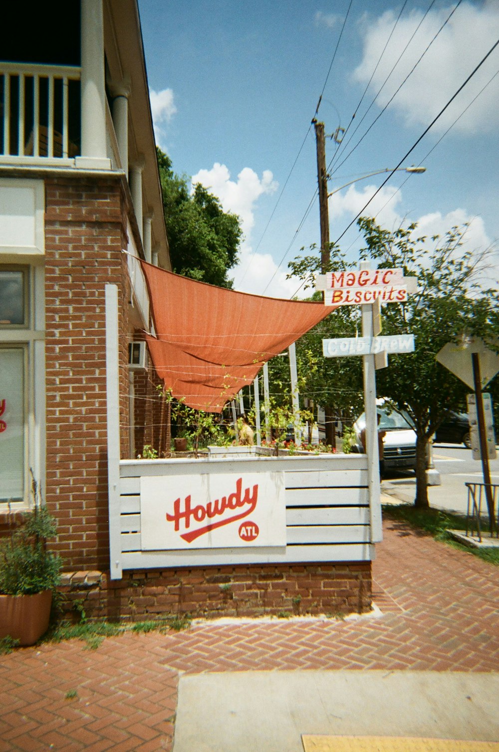 a brick building with a sign for a restaurant