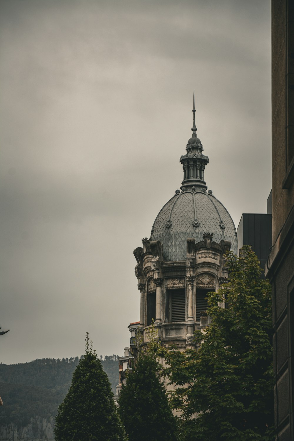 a tall building with a dome on top of it