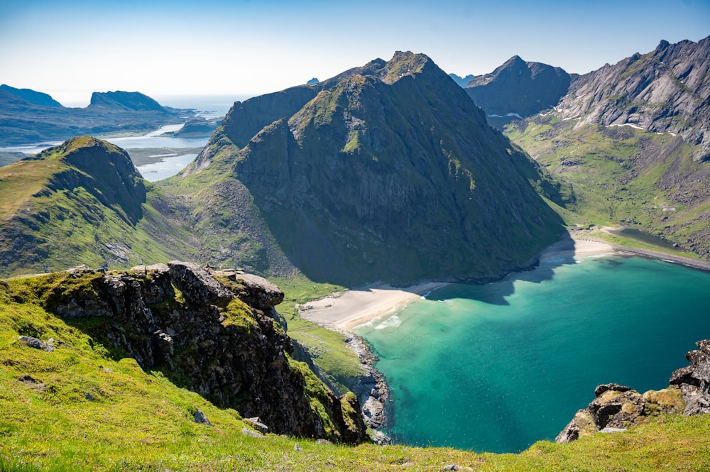 a mountain range with a lake in the middle of it