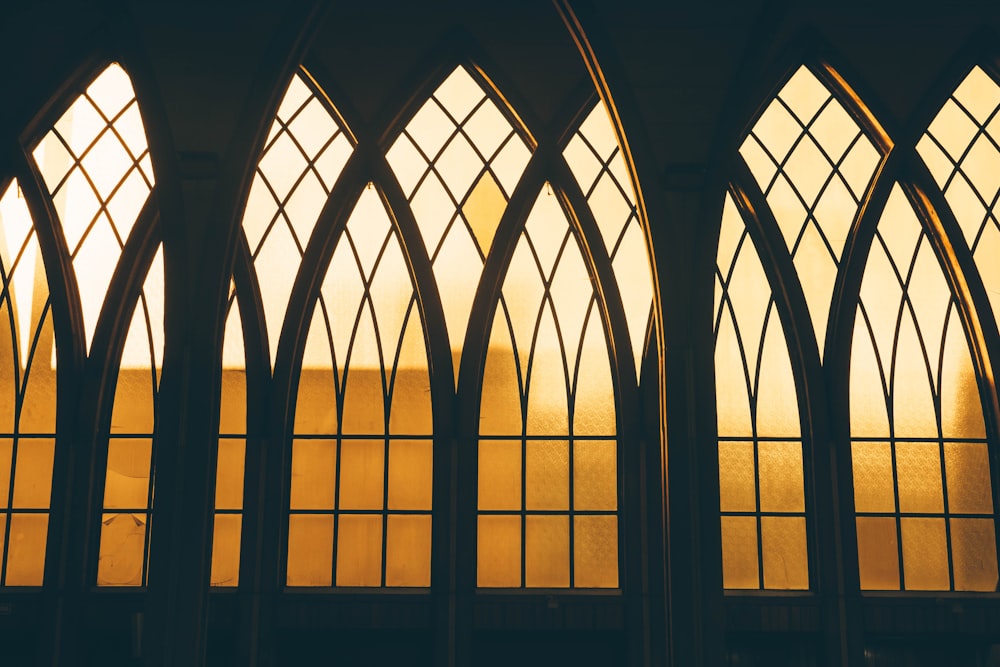 a row of arched windows sitting next to each other