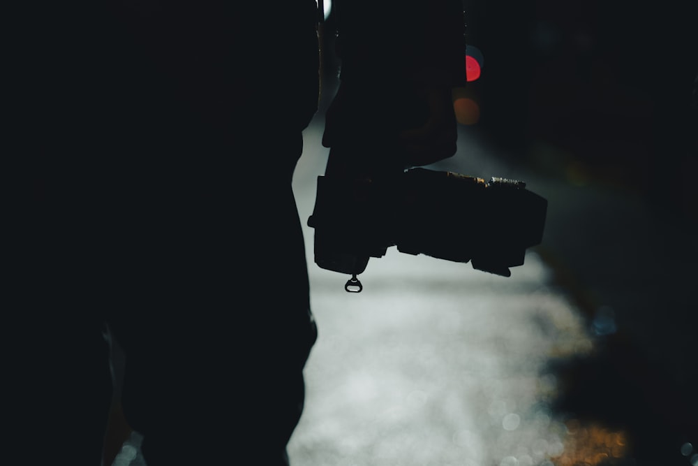 a blurry photo of a person holding a camera