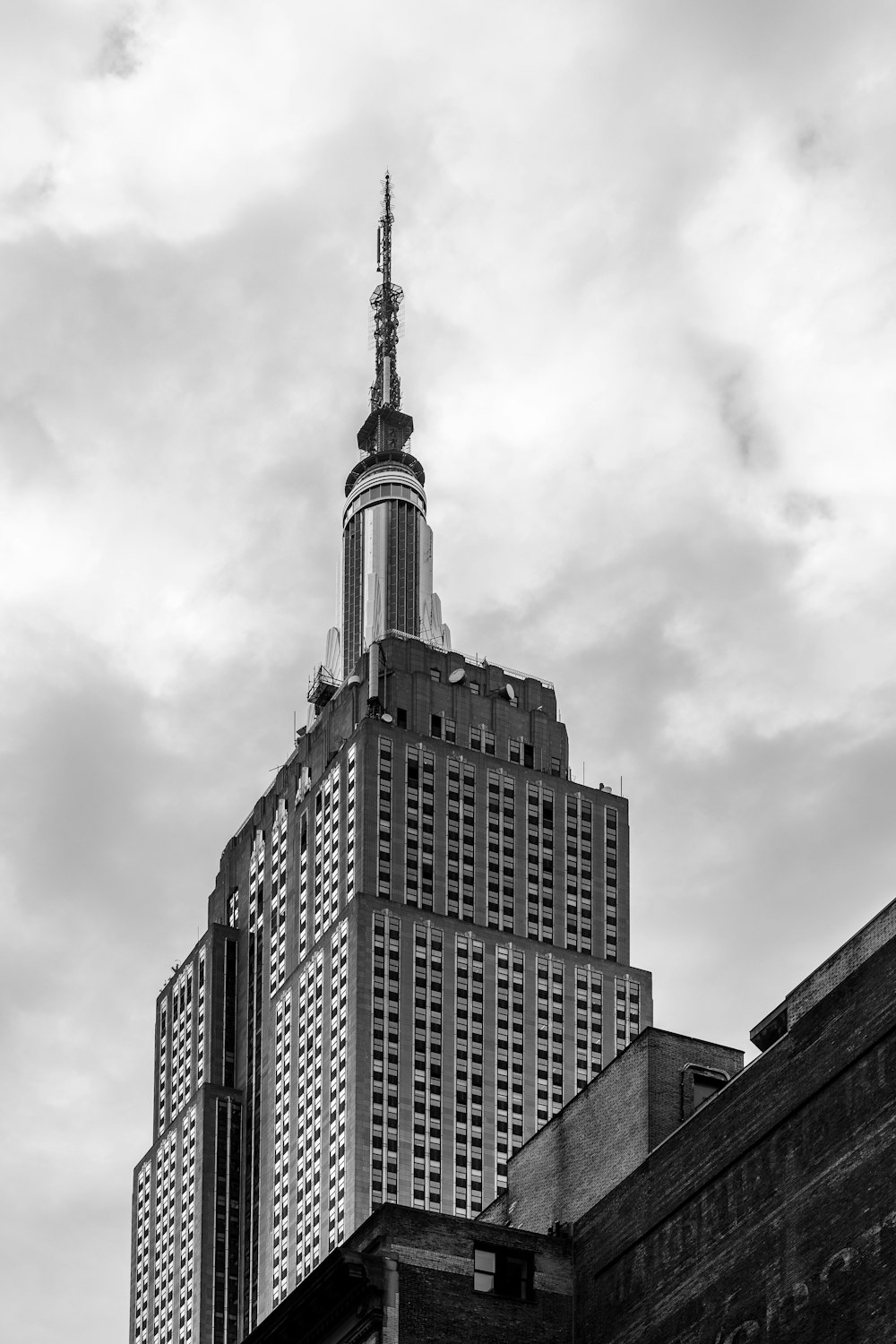 a black and white photo of a tall building