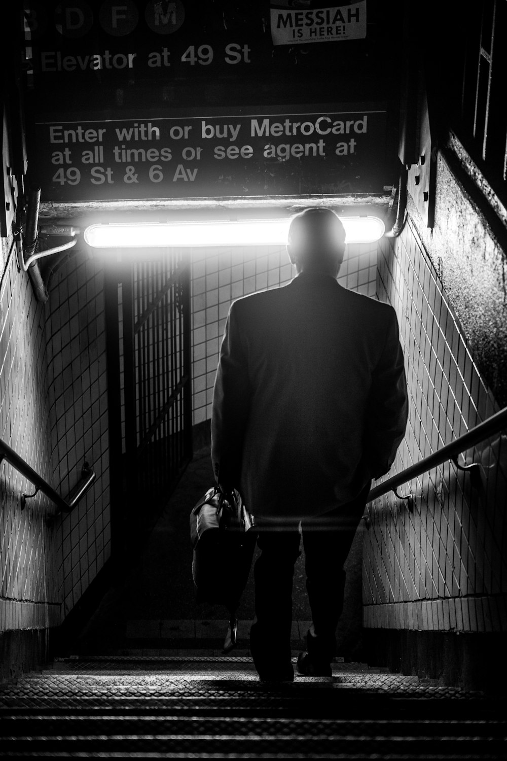 a man walking down a flight of stairs