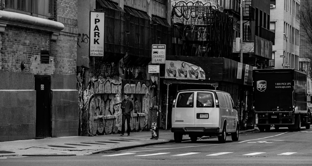 a van is parked on the side of the road