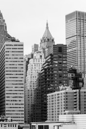 Modern Dubai skyline in grayscale with a focus on high-rise residential buildings.