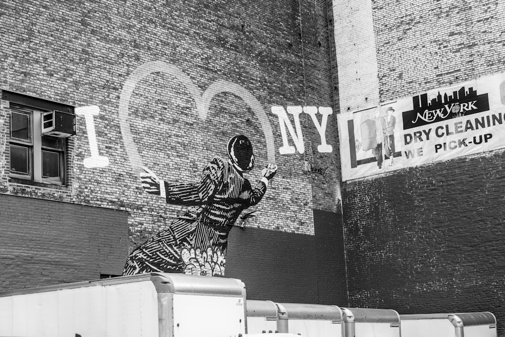 a black and white photo of a person on a skateboard