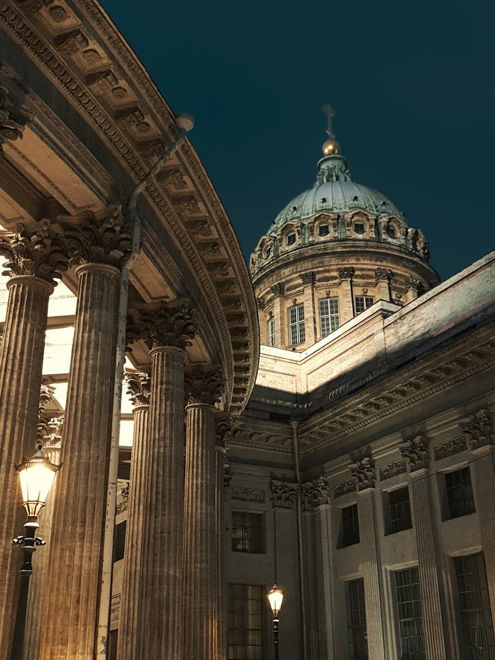 a large building with columns and a dome