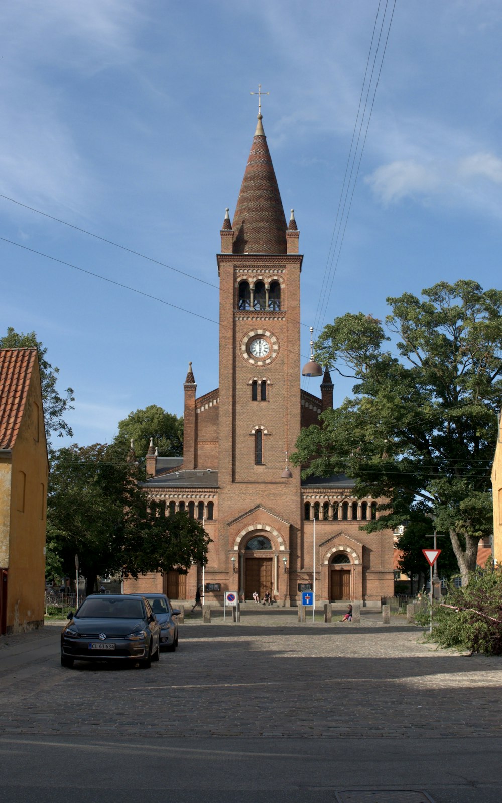 a large brick building with a clock tower