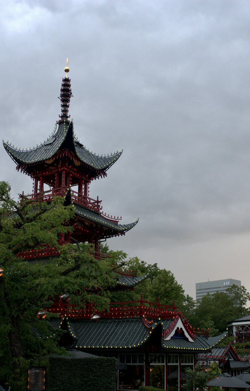 a tall tower with a clock on top of it