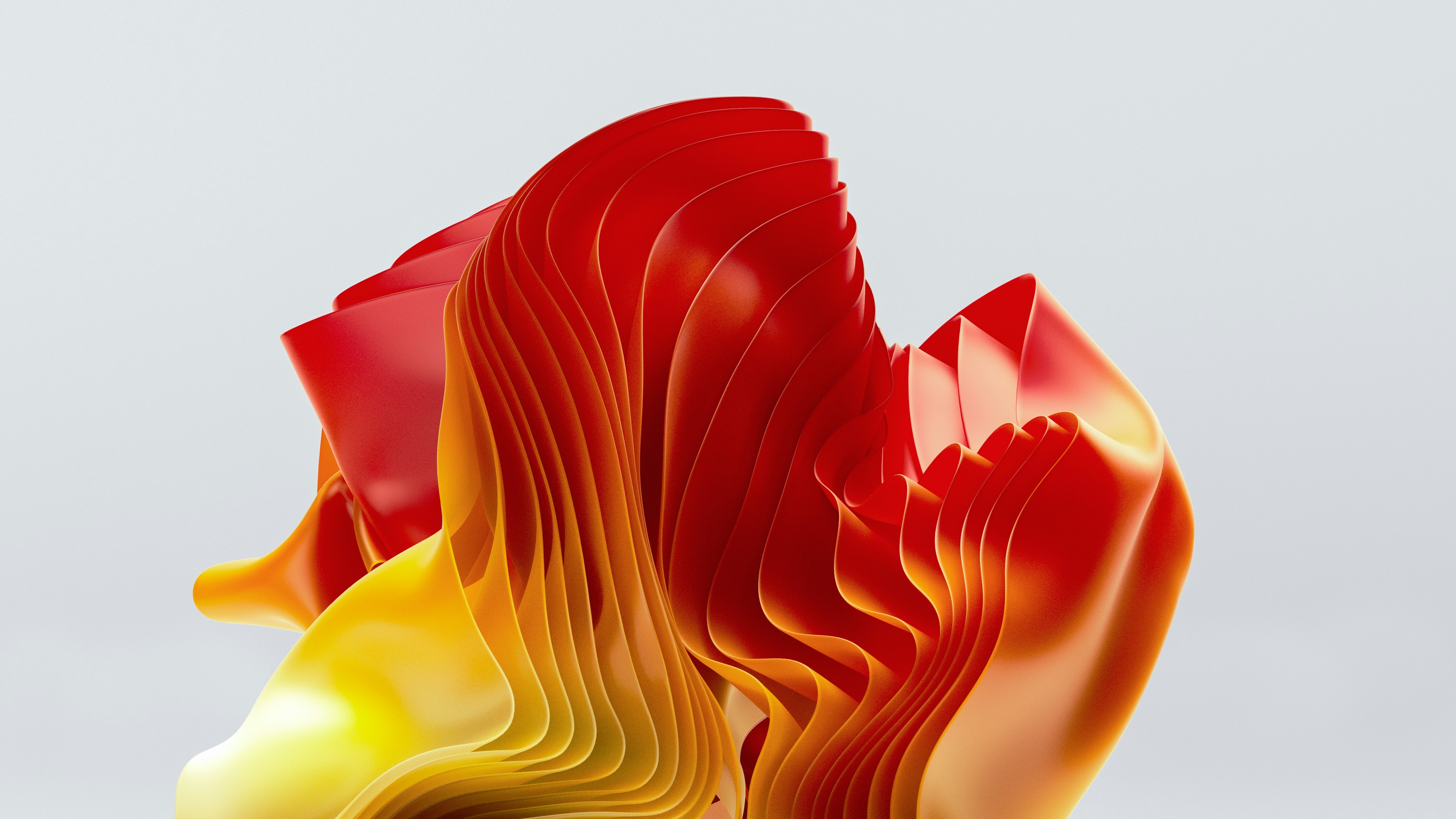 um grupo de vasos vermelhos e amarelos sentados um ao lado do outro