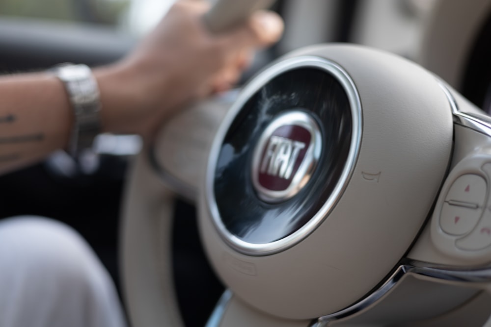 a close up of a person driving a car