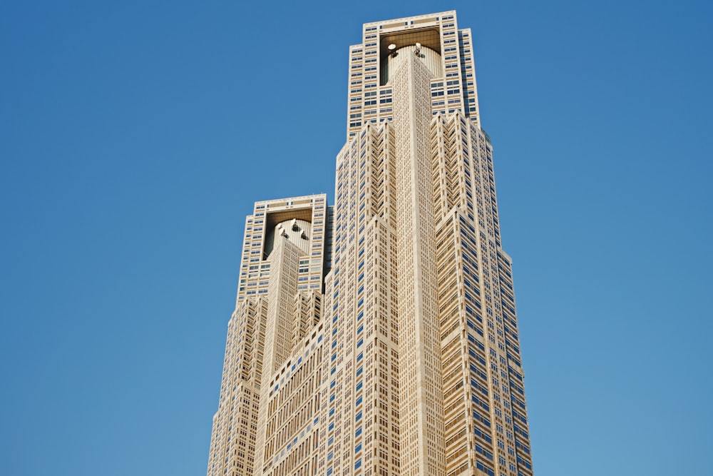 a very tall building with a clock on it's face