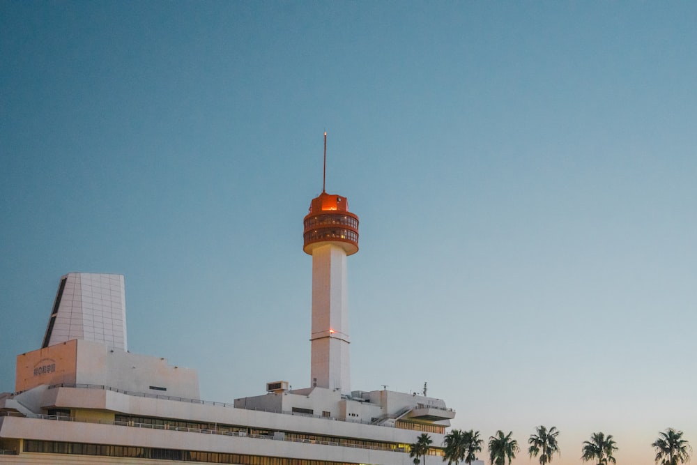 a large building with a tower in the middle of it