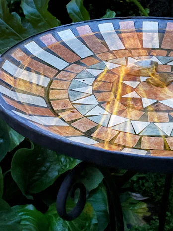 Custom terrazzo table top featuring warm earth tones and a glossy finish