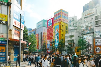 Casual street scene with young people wearing anime casual apparel, laughing and hanging out.
