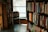 A cozy reading nook with an open book and soft natural light.
