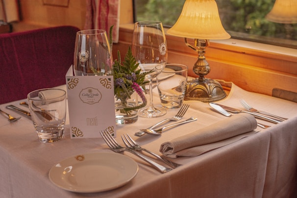 A beautifully set dining table in a hotel restaurant.