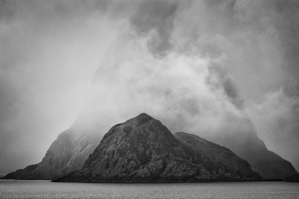 a black and white photo of a mountain