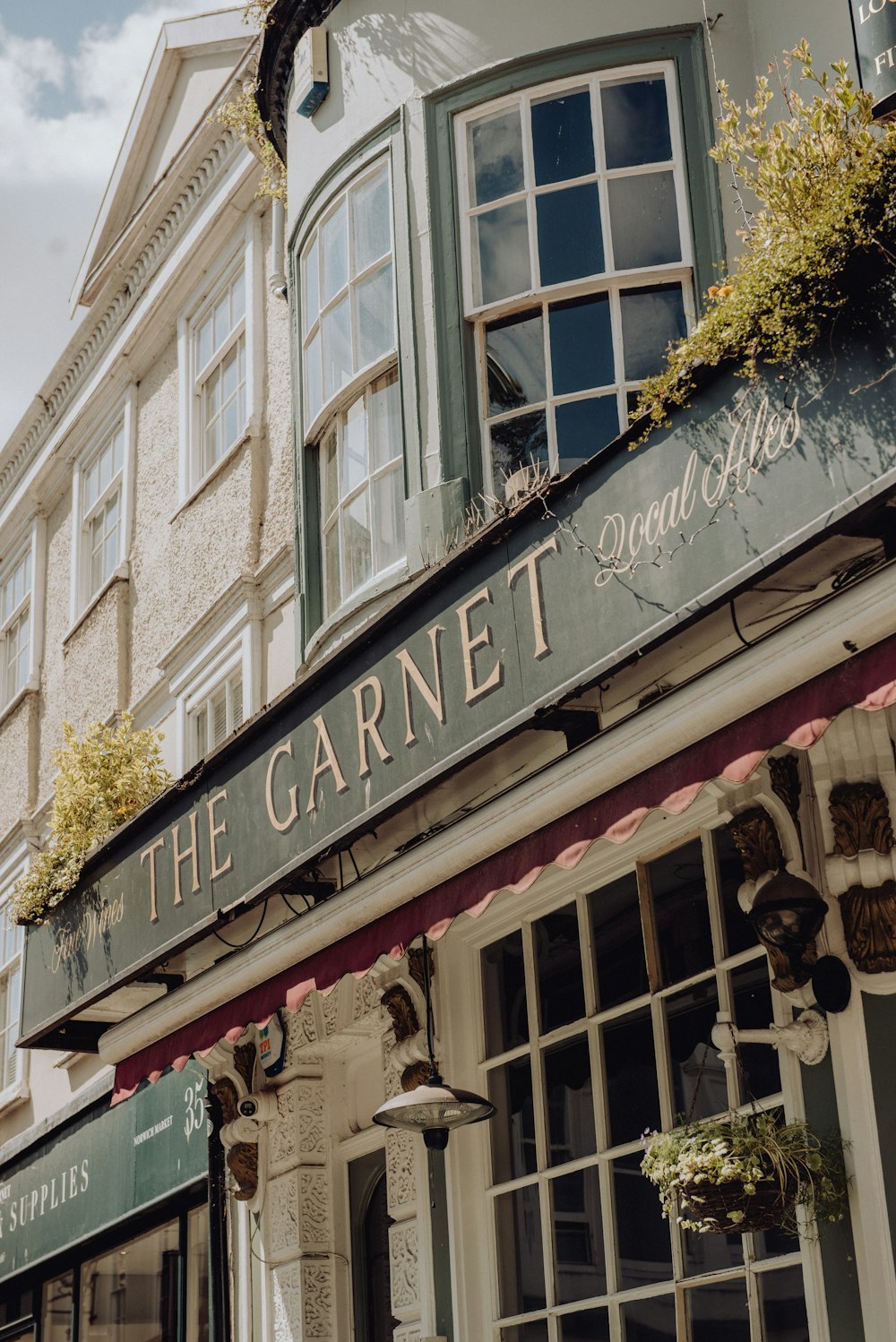 a building with a sign that says the garnet