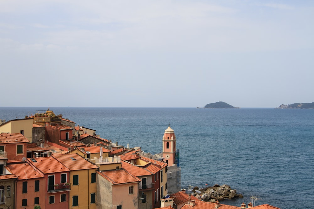 a view of the ocean from a rooftop of a building