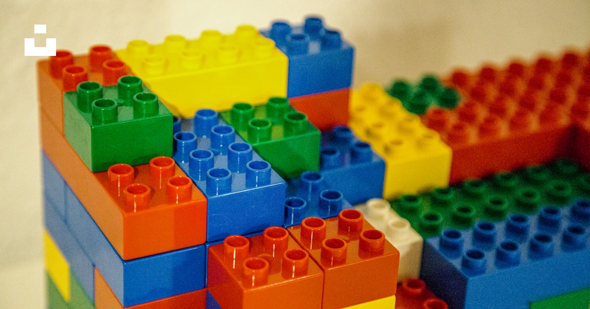 A stack of legos sitting on top of a table photo – Free Image on Unsplash
