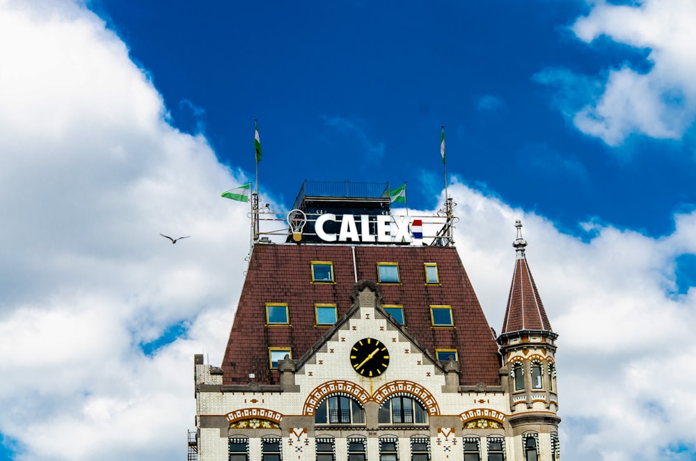 a tall building with a clock on the top of it