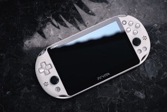 A vibrant collage showcasing iconic Sony gaming consoles from PS1 to PS Vita.