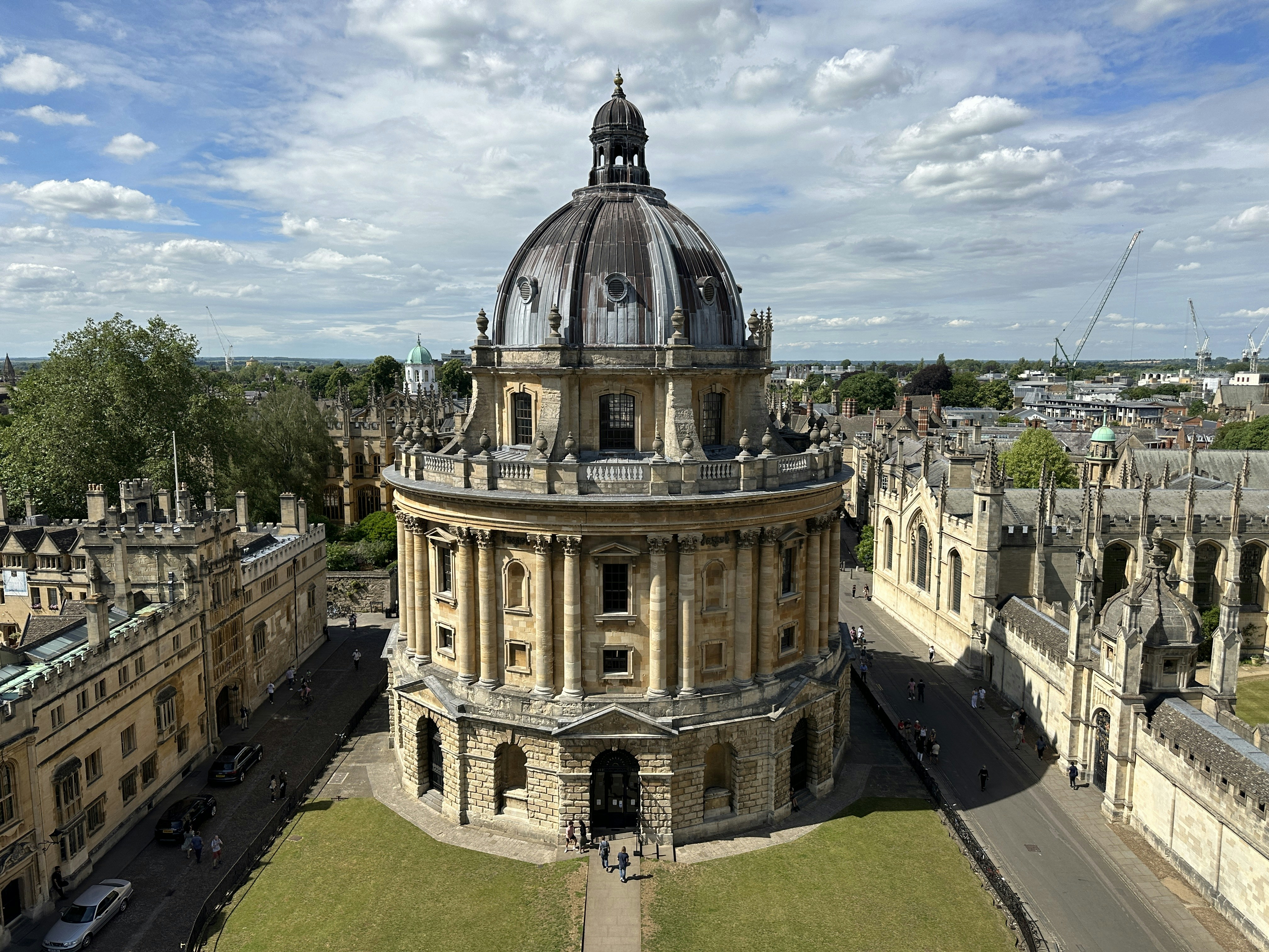 an aerial view of a large building with a dome