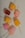 A colorful assortment of artisanal ice pops displayed on a wooden table.