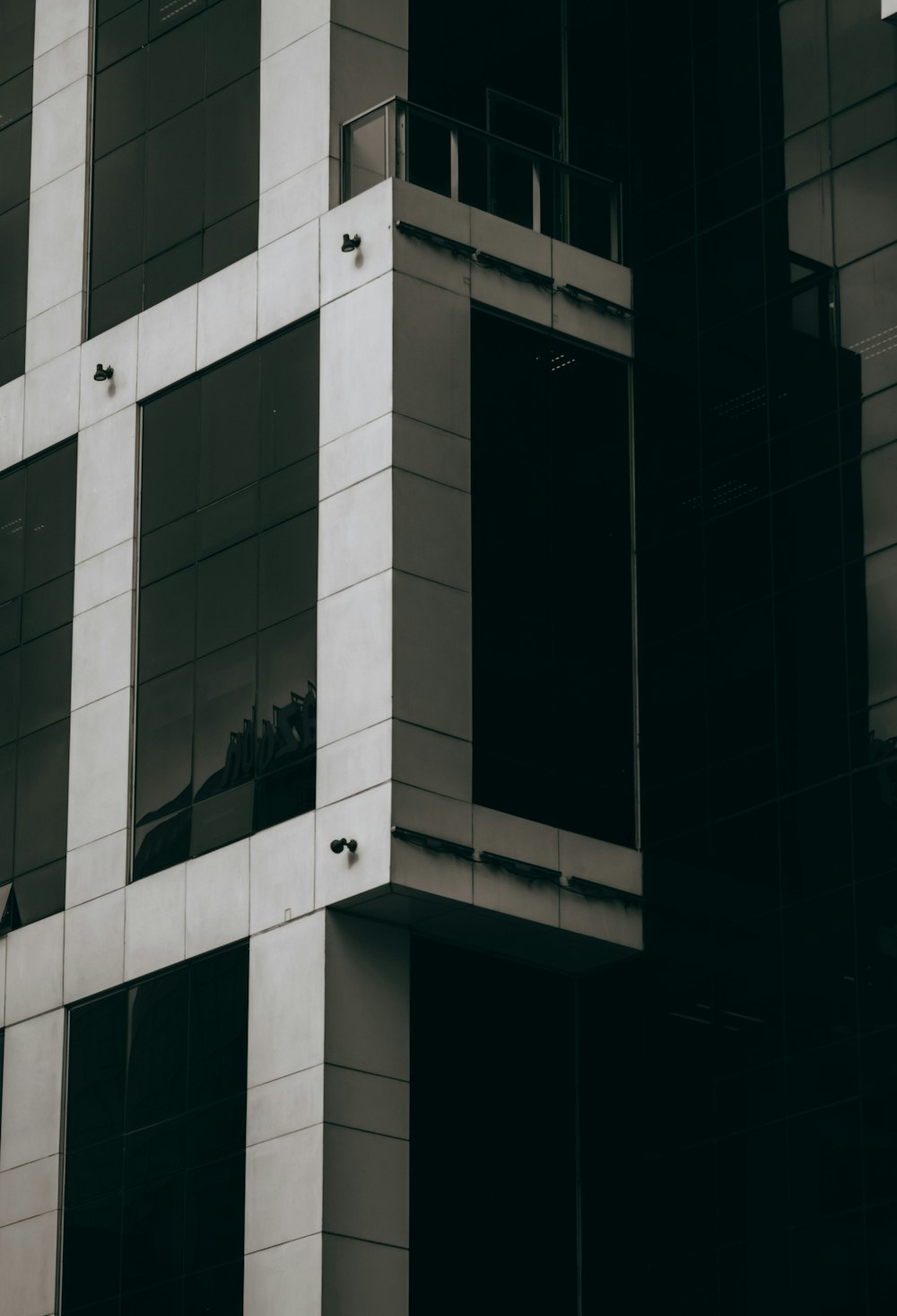 a black and white photo of a tall building