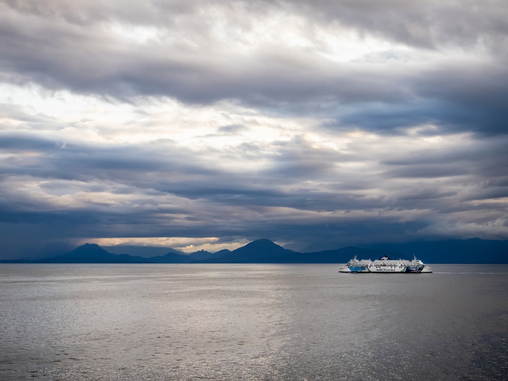 a large boat floating on top of a large body of water