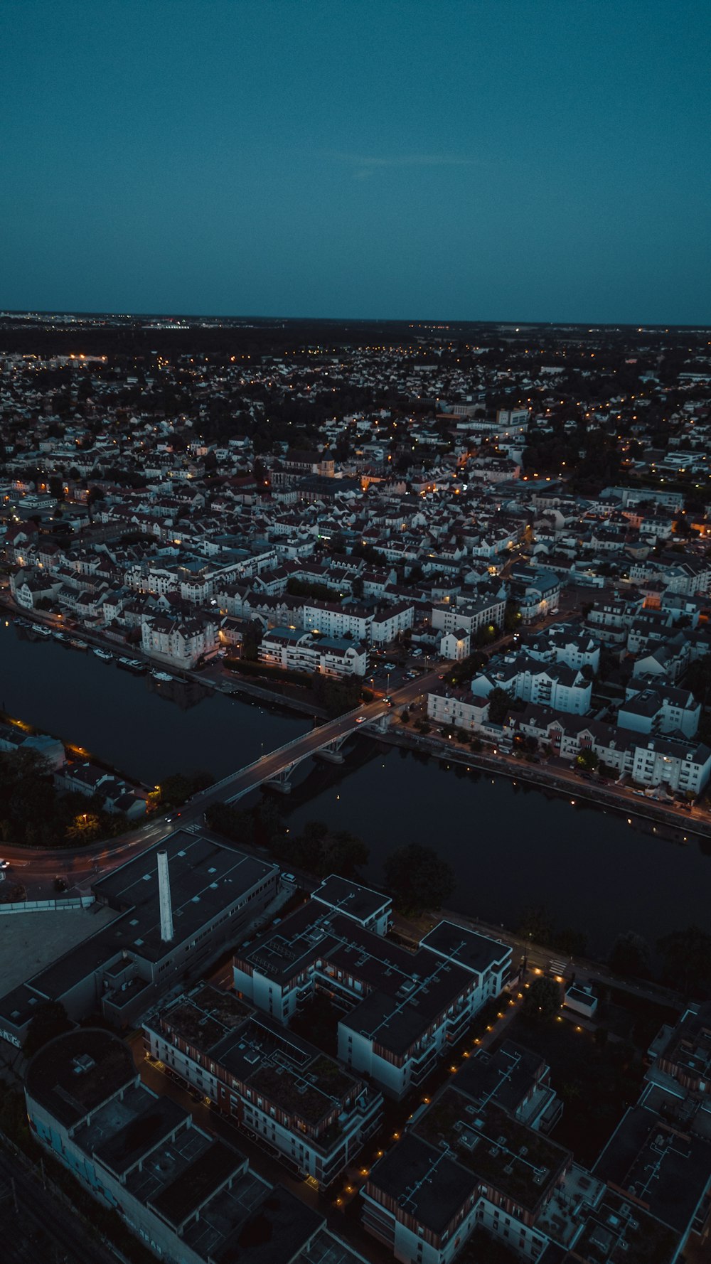 an aerial view of a city at night