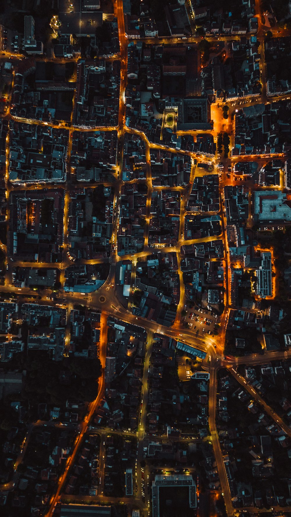 an aerial view of a city at night