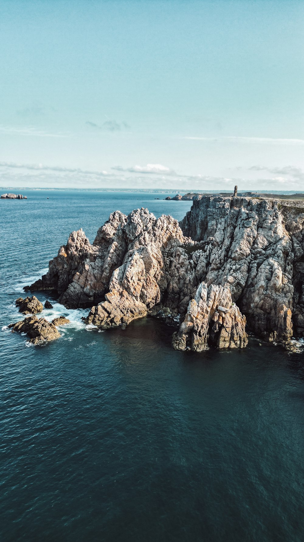 a large body of water surrounded by rocks