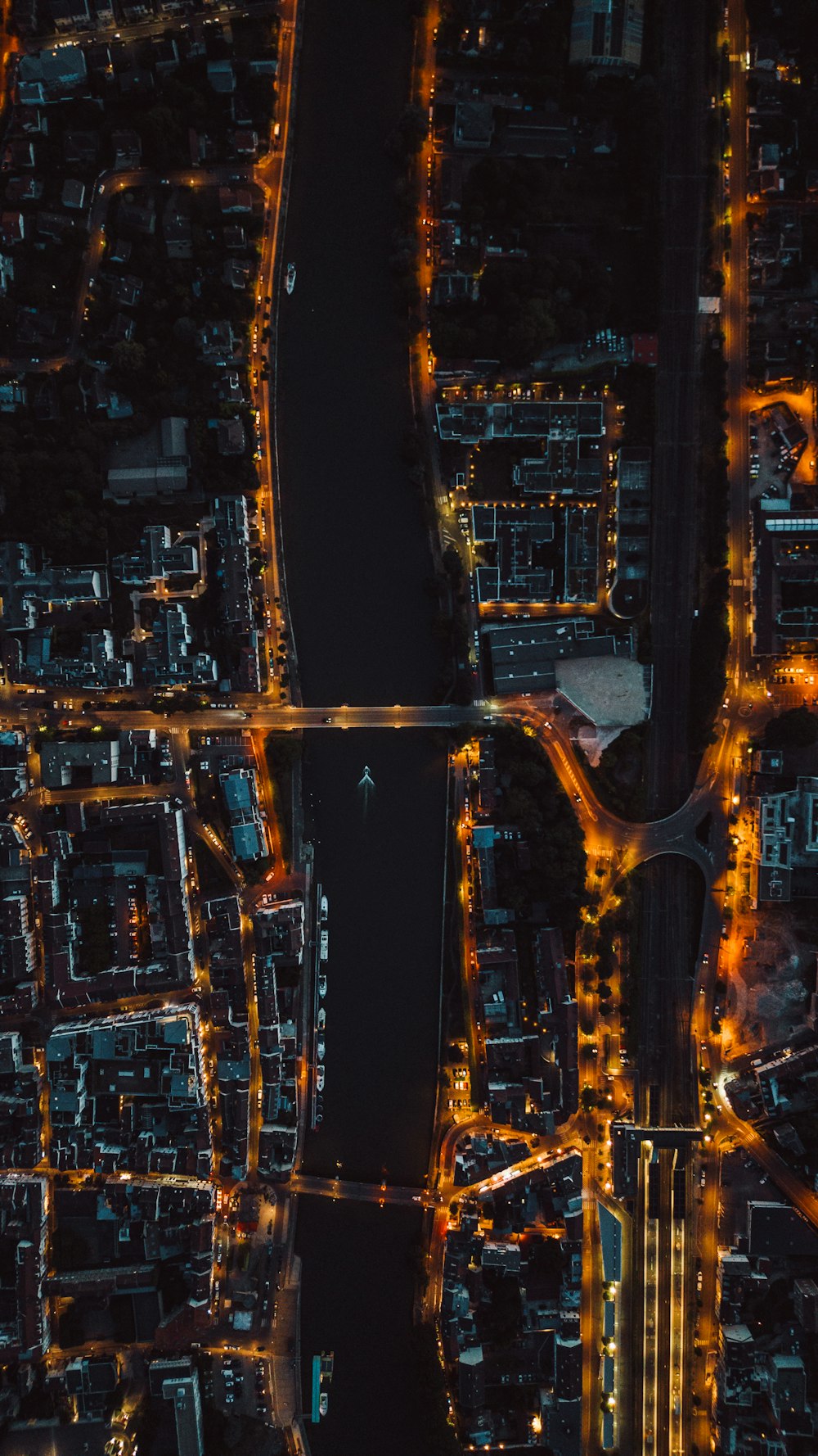 an aerial view of a city at night