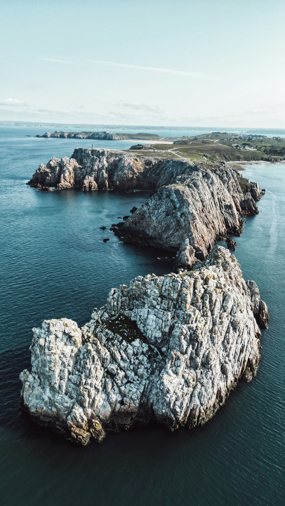 a large body of water surrounded by rocks