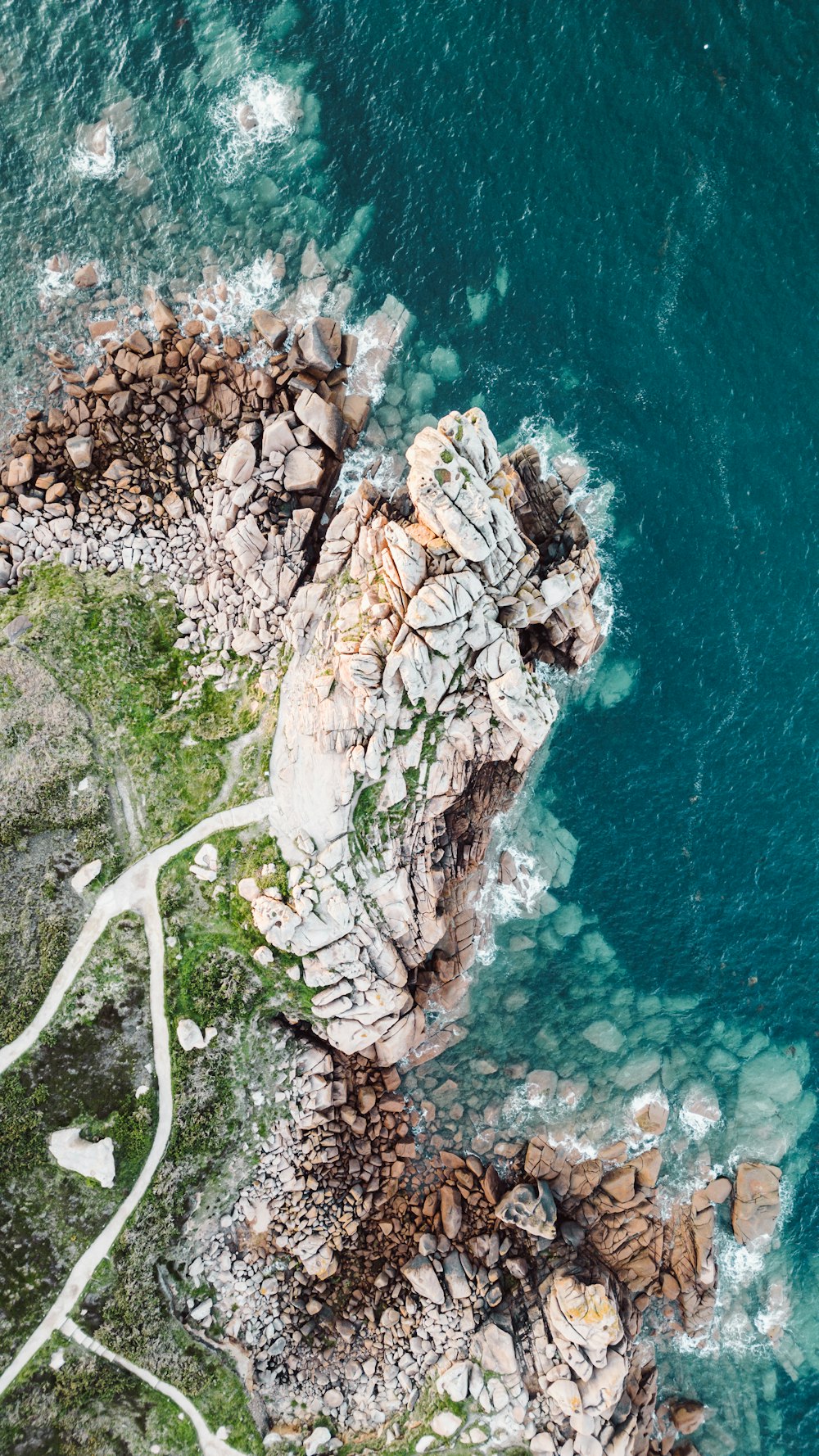 a bird's eye view of a rocky coastline